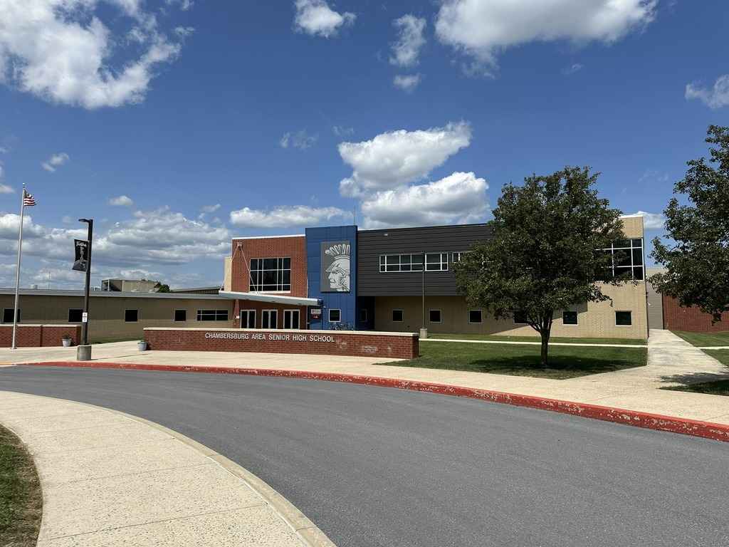 Entrance to Chambersburg High School in Franklin County, Pennsylvania, featuring a modern brick and glass design.