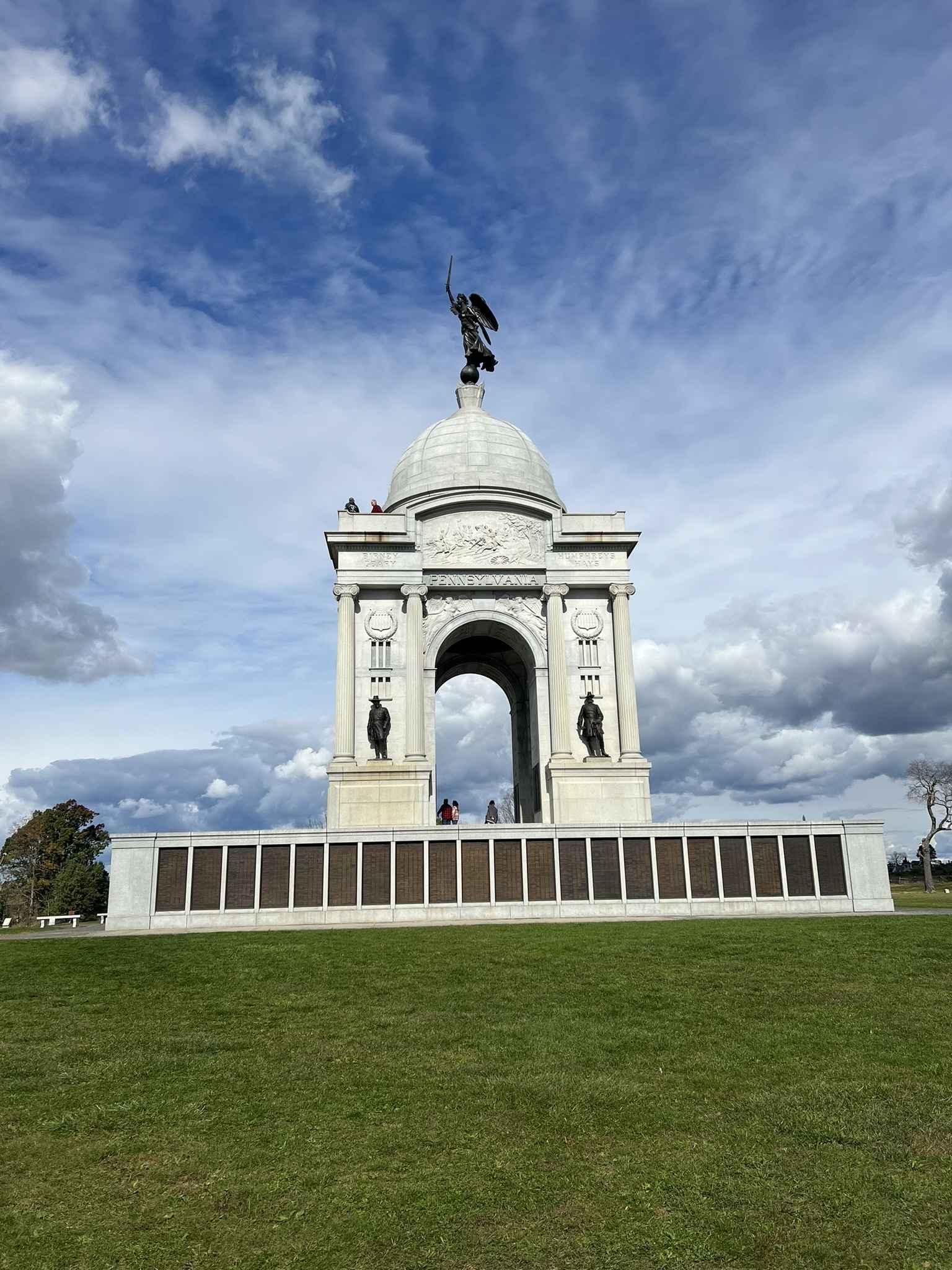 Visit the iconic Pennsylvania Memorial at Gettysburg, a must-see landmark surrounded by open green spaces, perfect for history enthusiasts and scenic photography.